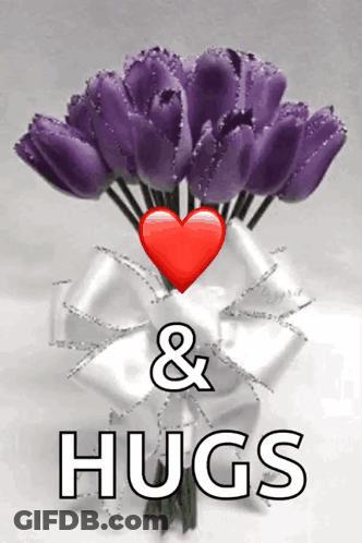 A Bouquet Of Purple Tulips With A Red Heart And The Words Hugs GIF