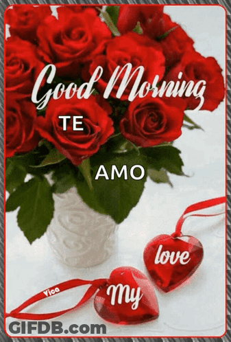 A Bouquet Of Red Roses In A Vase Next To Two Hearts That Say Love My GIF