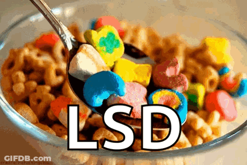 A Bowl Of Cereal With A Spoon And The Word Lsd GIF