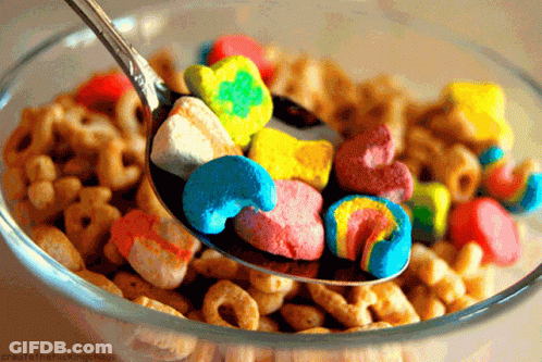 A Bowl Of Cereal With Lucky Charms And Marshmallows GIF