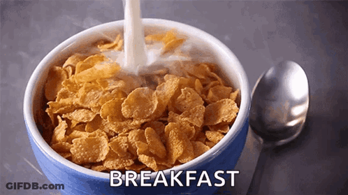 A Bowl Of Cereal With The Word Breakfast Written Above It GIF