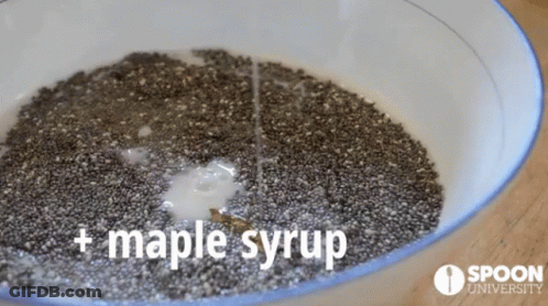 A Bowl Of Chia Seeds With Maple Syrup Being Poured Over Them GIF