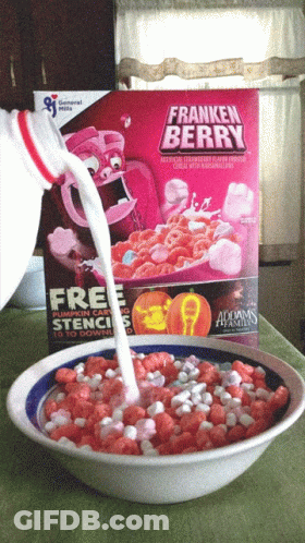 A Bowl Of Franken Berry Cereal With Milk Being Poured Into It GIF