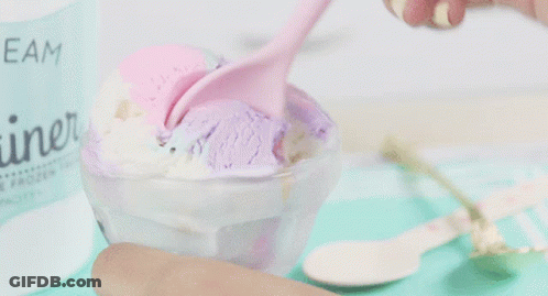 A Bowl Of Ice Cream With A Label That Says " Cream " GIF