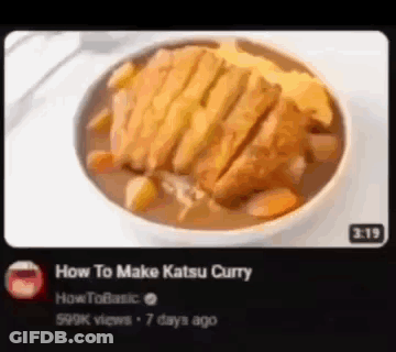 A Bowl Of Katsu Curry With Meat And Vegetables Is Being Shown On A Tv Screen . GIF