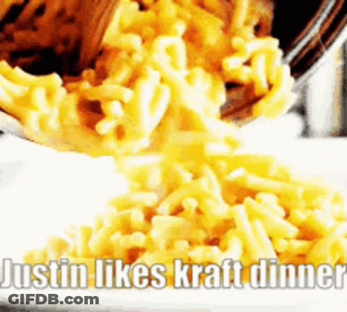 A Bowl Of Macaroni And Cheese Is Being Poured On A White Plate With The Caption Justin Likes Kraft Dinner GIF