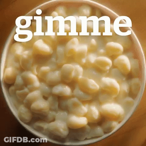 A Bowl Of Macaroni And Cheese With The Word Gimme On Top GIF