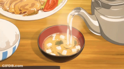 A Bowl Of Soup Next To A Bowl Of Rice GIF
