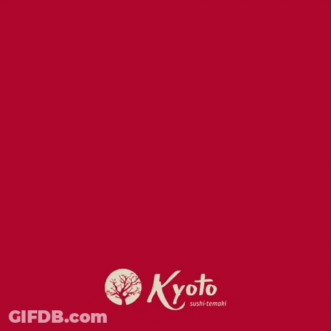A Bowl Of Yakisoba Noodles With Shrimp And Vegetables On A Red Background GIF