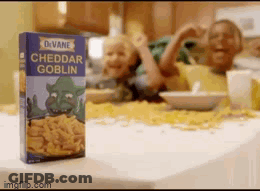 A Box Of Cheddar Goblin Sits On A Table GIF