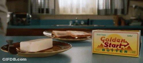 A Box Of Golden Start Butter Sits On A Table GIF