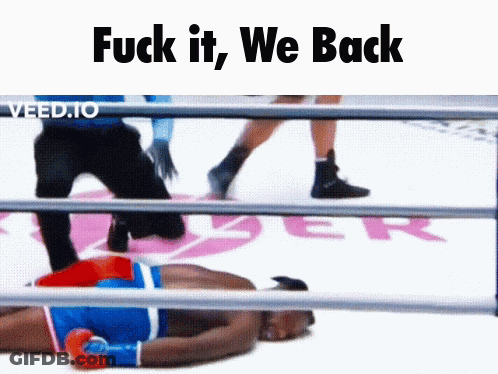 A Boxer Laying On The Ground In A Boxing Ring With The Words Fuck It We Back GIF