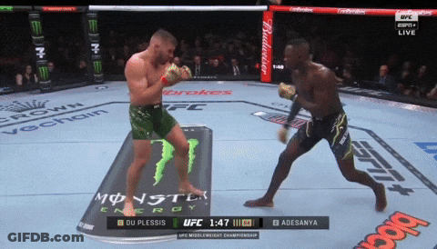 A Boxing Match Between Du Plessis And Adesanya Is Being Broadcast On Espn GIF