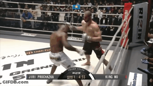 A Boxing Match Between Jiri Prochazka And King Mo Takes Place In A Ring GIF