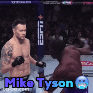 A Boxing Match With The Name Mike Tyson On The Screen GIF
