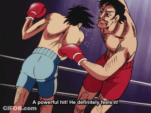 A Boxing Match With The Words " A Powerful Hit He Definitely Feels It " In The Corner GIF