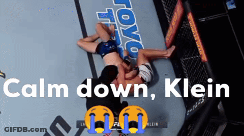 A Boxing Match With The Words Calm Down Klein On The Bottom GIF