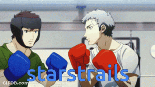 A Boxing Match With The Words Starstrails In Blue Letters GIF