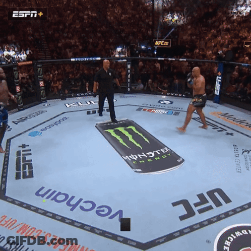 A Boxing Ring With A Monster Energy Advertisement GIF