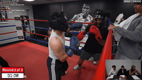 A Boxing Ring With A Round 3 Of 3 On The Clock GIF