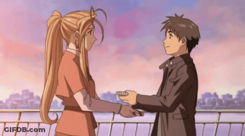 A Boy And A Girl Are Holding Hands In Front Of A City GIF