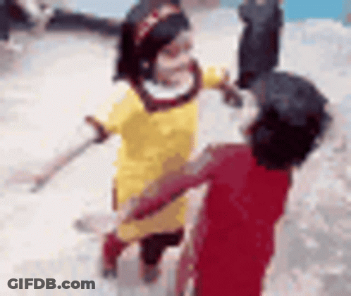 A Boy And A Girl Are Hugging Each Other . GIF