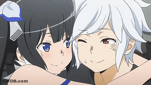 A Boy And A Girl Are Hugging Each Other And Looking At Each Other . GIF