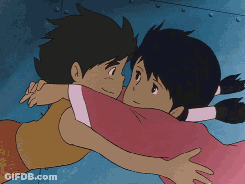 Boy And Girl Hugging In Cartoon GIF