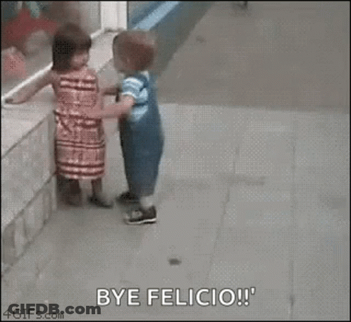 A Boy And A Girl Are Hugging On The Sidewalk . GIF