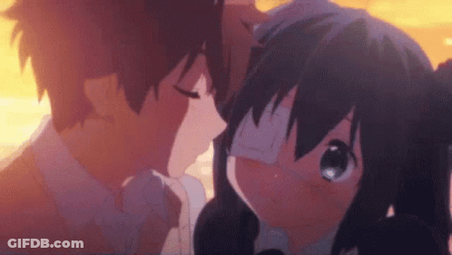 A Boy And A Girl Are Kissing Each Other In A Anime Scene . GIF