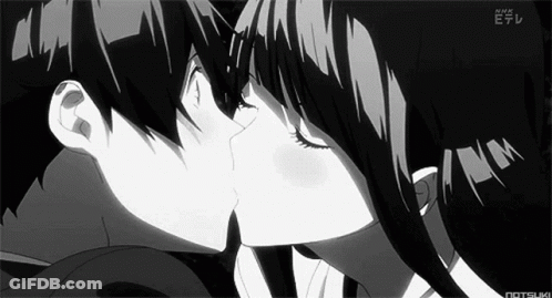 A Boy And A Girl Are Kissing In A Black And White Anime . GIF
