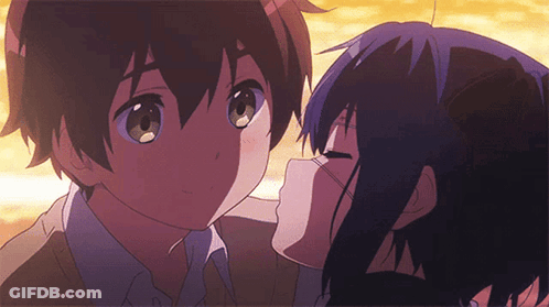 A Boy And A Girl Are Kissing In A Cartoon GIF