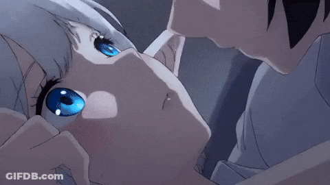 A Boy And A Girl Are Kissing In A Dark Room GIF