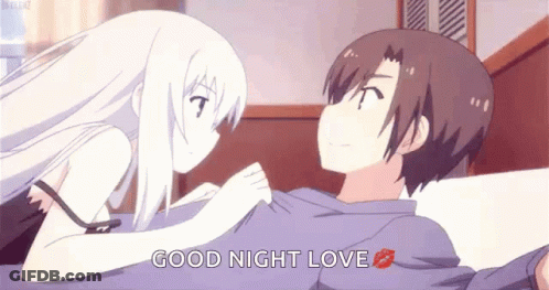 A Boy And A Girl Are Kissing On A Bed With The Words `` Good Night Love '' . GIF