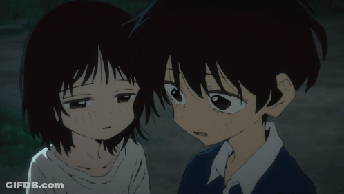 A Boy And A Girl Are Looking At Each Other GIF