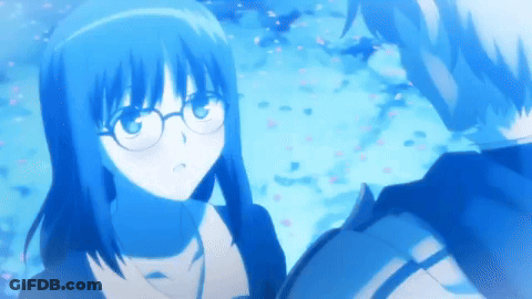 A Boy And A Girl Are Looking At Each Other And The Girl Is Wearing Glasses GIF