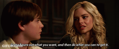 A Boy And A Girl Are Looking At Each Other And The Girl Says Gotta Figure Out What You Want GIF