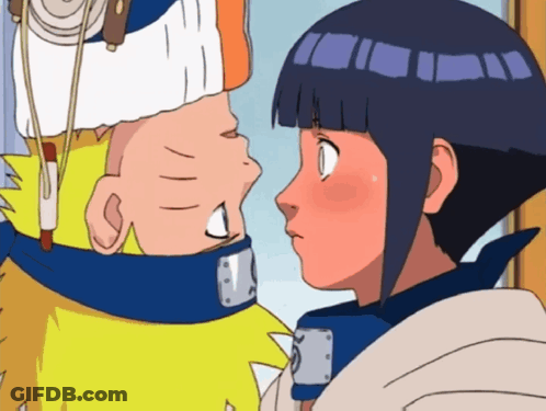 A Boy And A Girl Are Looking At Each Other GIF