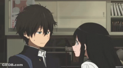 A Boy And A Girl Are Looking At Each Other With A Calendar Behind Them That Says 10 GIF