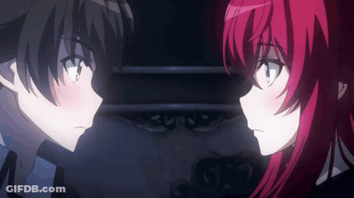 A Boy And A Girl Are Looking At Each Other With Their Eyes Closed GIF