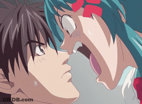 A Boy And A Girl Are Looking Into Each Other 'S Eyes GIF