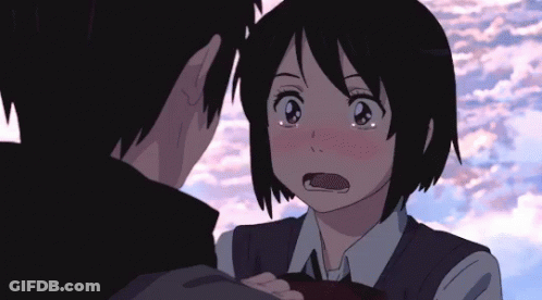 A Boy And A Girl Are Looking Into Each Other 'S Eyes GIF