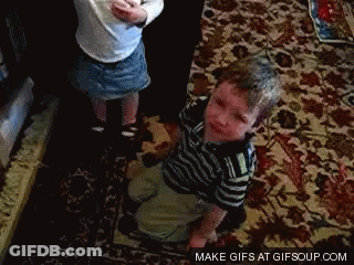 A Boy And A Girl Are Playing On A Rug With The Words Make Gifs At Gifsoup.com GIF