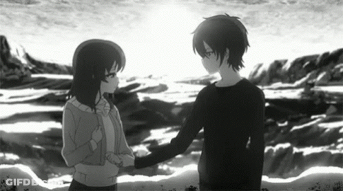 A Boy And A Girl Are Shaking Hands In Front Of A Body Of Water . GIF