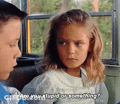 A Boy And A Girl Are Sitting On A Bus And The Girl Is Asking The Boy Are You Stupid Or Something . GIF