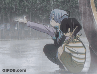 A Boy And A Girl Are Squatting In The Rain And The Girl Is Pointing At Something GIF