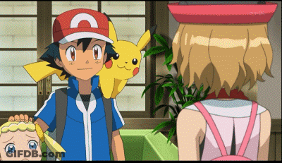 A Boy And A Girl Are Standing Next To Each Other GIF