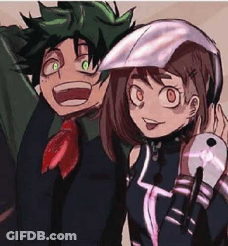 A Boy And A Girl Are Standing Next To Each Other And Smiling . GIF