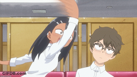 A Boy And A Girl Are Standing Next To Each Other And The Girl Has Her Arm Up GIF