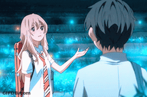 A Boy And A Girl Are Standing Next To Each Other And The Girl Is Holding Out Her Hand GIF